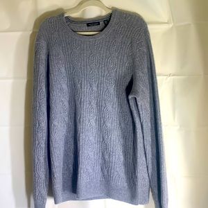 Sam’s Fifth Avenue gray Cashmere sweater.